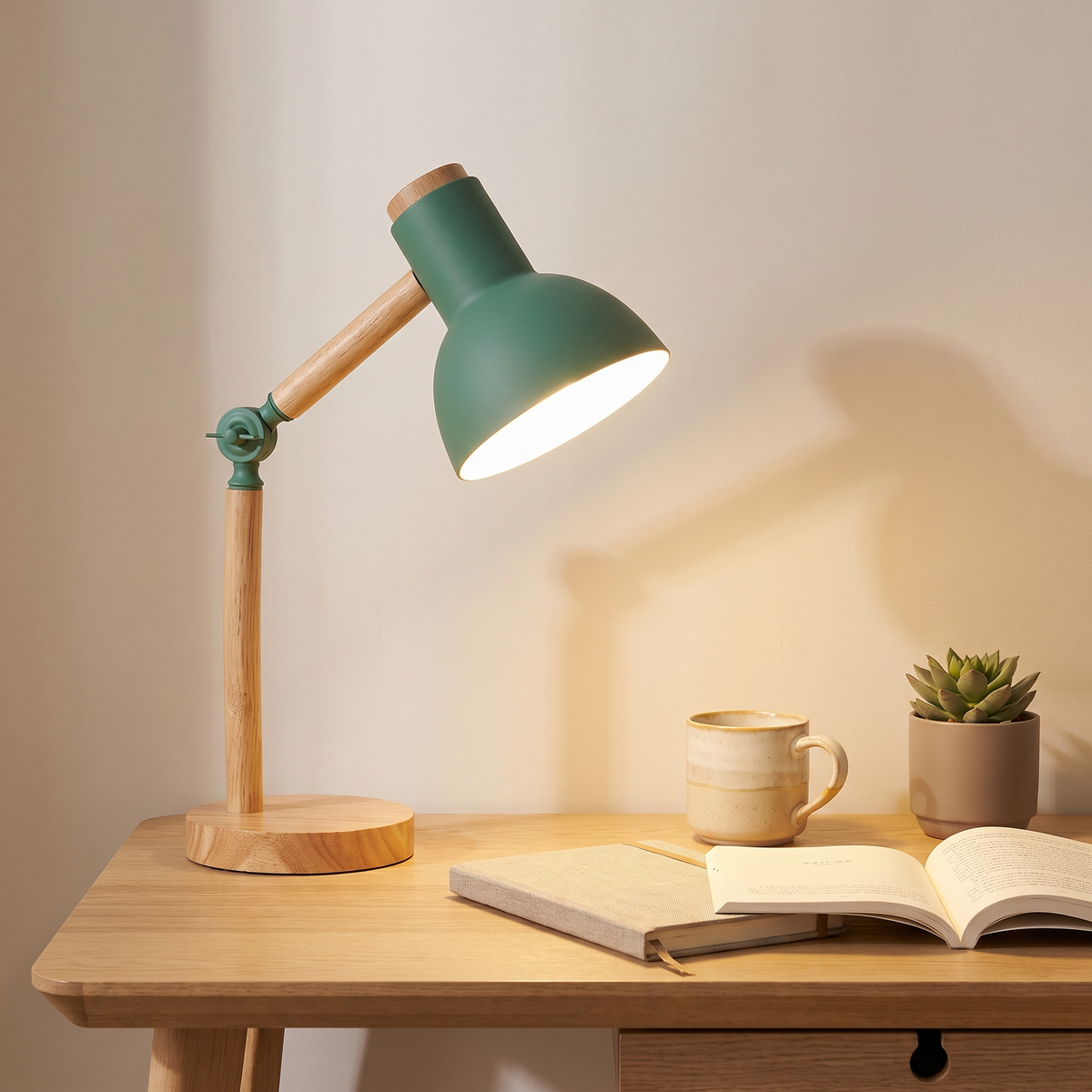 Nordvik desk lamp lighting an open book