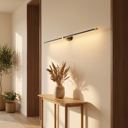 Lumora wall sconce above a hallway console