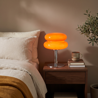 Vetra glass lamp on a bedroom nightstand